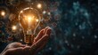 © Sarinrata - Glowing light bulb in a hand with gears and mechanical elements, symbolizing engineering and invention