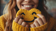 © Yiss Design - Woman Holding Smiley Face Crochet
