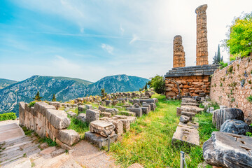 Delphi with ruins of the Temple of the ancient Sanctuary of Apollo in Delphi, Greece, at the Mount Parnassus