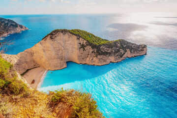 Wall Mural - Zakynthos, Greece. Navagio Beach with wrecked ship in Ionian Sea. Beautiful views of azure sea water and nature with cliffs cave.