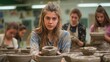 © Coffee Cafe Lover - Creative Pottery Class: Diverse Group of Students Crafting Unique Clay Pieces on Pottery Wheels in Art Studio