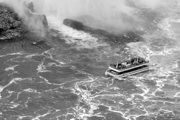 Wall Mural - Boat cruise under Niagara Falls, aerial view