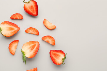 Wall Mural - Slices of fresh strawberries on white background