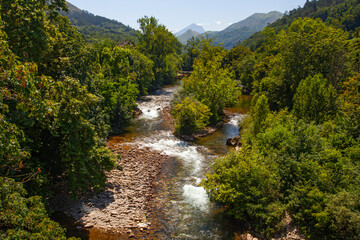 Beautiful mountain river and ancient bridge in Olla de San Vicente , Spain