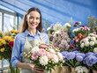 © Iuliia - A beautiful happy florist surrounded by vibrant flowers