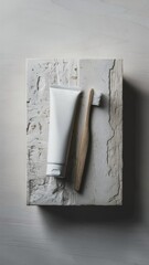 Poster - A toothbrush and tube of toothpaste on a stone surface, AI