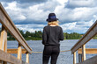 © SandraSevJarocka - blonde woman at the pier in Rovaniemi Finland in summer time