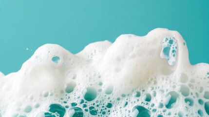 Poster - Bubbles and foam create a vibrant pattern, highlighting the textures and shapes against a refreshing teal backdrop