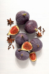 Wall Mural - Fresh ripe figs on a white background