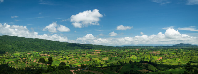 Wall Mural - Beautiful natural panoramic countryside landscape. Rainforest ecosystem and healthy environment concept background. Top view forest and mountain in Thailand.