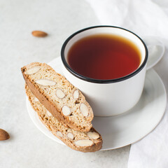 Wall Mural - almond biscotti on a white plate, almond cantucci cookies on a white plate