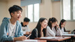 © Nitcharee - An Asian high school students sitting at classroom and enjoy learning and study