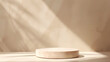 © xuan - Round display stand on beige background
