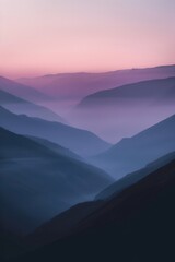 Poster - A serene landscape shot of a mountain range during the golden hour at sunset