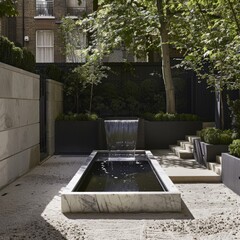 Poster - Modern backyard with a marble water feature.