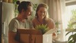 © Generative AI - Concept of happy couple moving to new apartment Young family unpacking cardboard boxes things stuff at new home Moving house real estate property purchase rental delivery concept : Generative AI