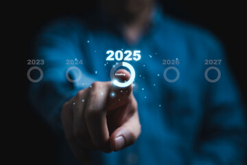 Wall Mural - businessman touching to loading of 2025 year for countdown merry christmas and happy new year concep