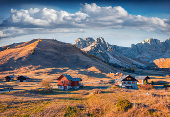 Wall Mural - Attractive autumn view of country road in Fuchiade valley. Spectacular morning landscape of Dolomite Alps, Italy, Europe. Majestic outdoors scene of Italy. Beauty of countryside concept background.