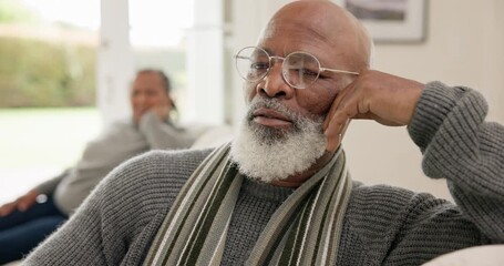 Wall Mural - Elderly, couple and angry on sofa with conflict, argument or marriage problems in living room of home. Senior, black people and frustrated for fighting, breakup or divorce with communication on couch