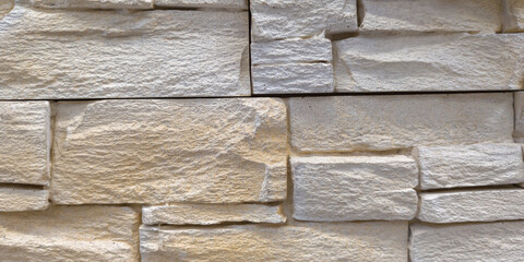 Wall Mural - facade detail stone brown gray wall background of brick horizontal lines stone grey wallpaper