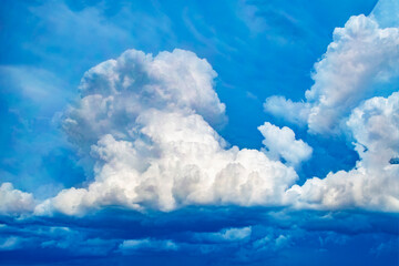 Wall Mural - Sky with damatic cloud caught by rising air currents.