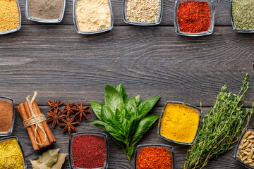 Wall Mural - A vibrant assortment of various spices and herbs displayed together