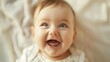 © vefimov - Happily smiling baby with delighted expression