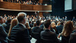 © Kevin - Large Group of Business Professionals at a Conference