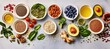 © IQRAMULSHANTO - Colorful array of fresh fruits, vegetables, grains, seeds, and flowers on grey background, space for text.