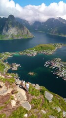 Wall Mural - discover the breathtaking lofoten islands in norway, where majestic mountains meet calm waters, perf