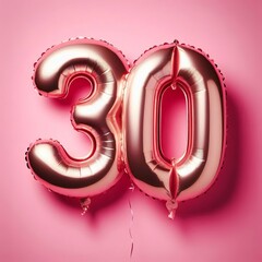 balloon in a shape of number 30 on pink background for birthday celebration