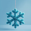 © Sawoon - Blue snowflake ornament felted hanging decoration handmade winter decor soft textile craft minimalist design copy space