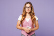 © ViDi Studio - Young smiling fun successful employee business woman corporate lawyer wear classic suit vest white t-shirt glasses work in office hold use mobile cell phone isolated on plain pastel purple background.