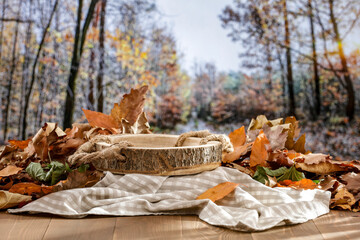 Sticker - Autumn composition and tree stump as a table in autumn forest background with space for food and products.
