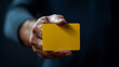 © whoopwhoops - yellow card held by football referee, isolated on a dark background