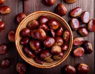 Wall Mural - Sweet Chestnuts Top view. Copyspace. Pile of ripe chestnuts for food background..