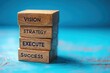 © ibnu - Stacked Wooden Blocks with Business Strategy Keywords