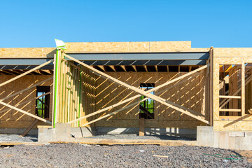 Wall Mural - beginning of construction of plywood house