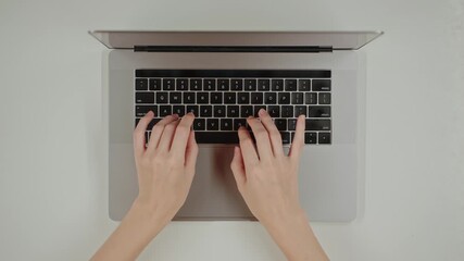 Top view table Close-up Female hands typing on a keyboard laptop. Woman working, using artificial intelligence tools, typing code prompt, text description, commands, chatbot, AI prompt engineering