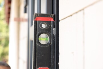 Sticker - Building level near newly installed door, closeup