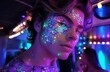 © Victoria - Young man with glittery makeup posing in nightclub
