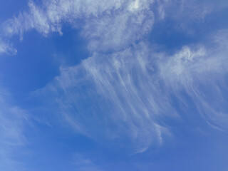 The sky is blue and clear with a few clouds scattered throughout