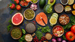 © mertingen - Healthy assortment of foods including salmon, nuts, and vegetables.