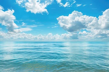 Aufkleber - A serene ocean scene with fluffy white clouds in the background