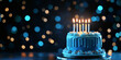 © Andres Mejia - Tasty blue birthday cake with burning candles is celebrating on blue bokeh background