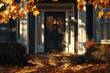© ma - A front door of an American house in the fall, leaves on ground