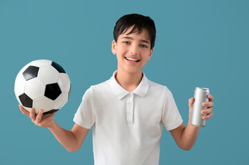 Wall Mural - Little boy with soccer ball and soda on blue background