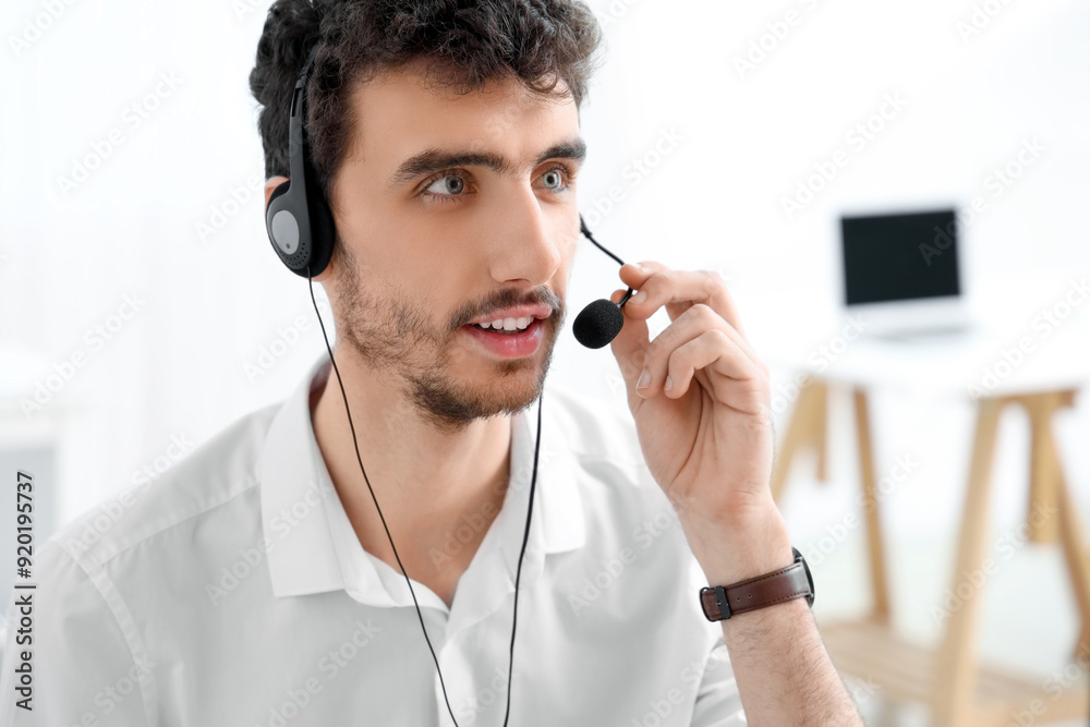 Male technical support agent  working in office