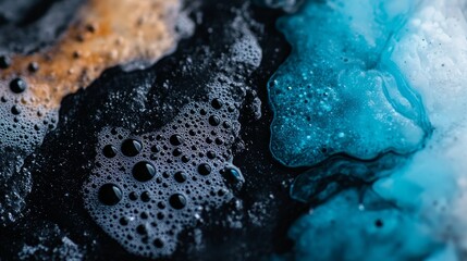 Wall Mural -  A tight shot of water and ice against a dark blue and black background, adorned with water droplets on the image's left side