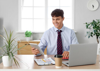 Sticker - Male accountant with tablet and clipboard at workplace in office